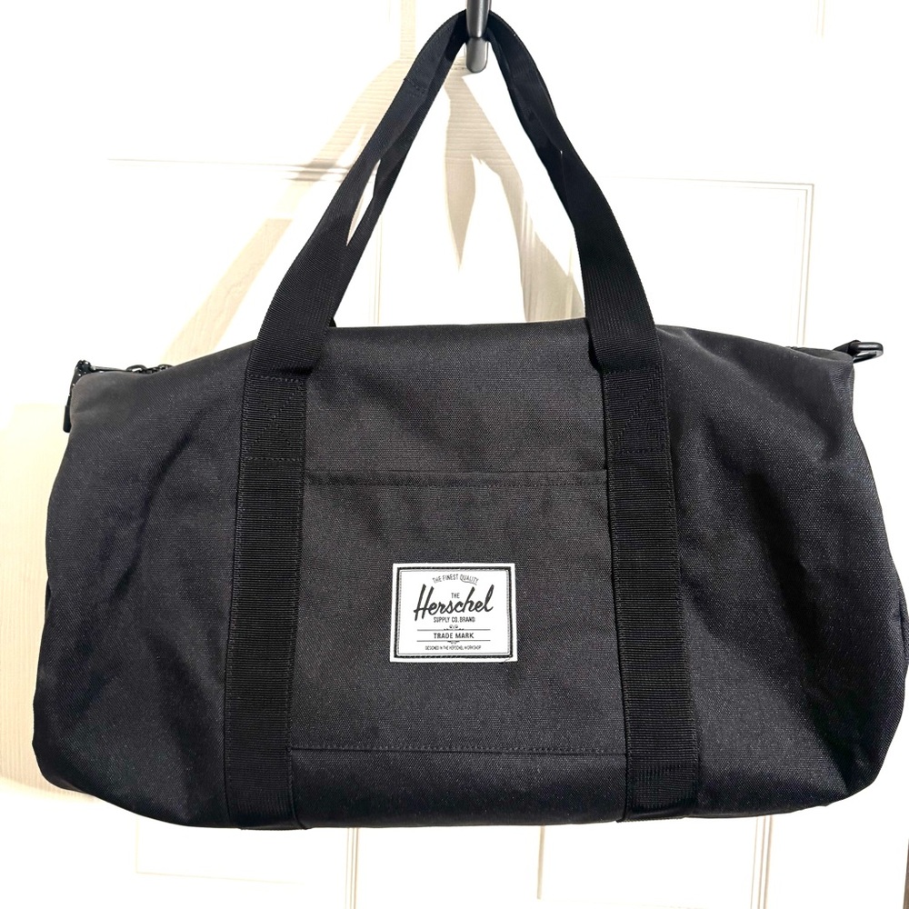 Herschel Supply Company Sutton Black Duffel Bag with White Logo Patch